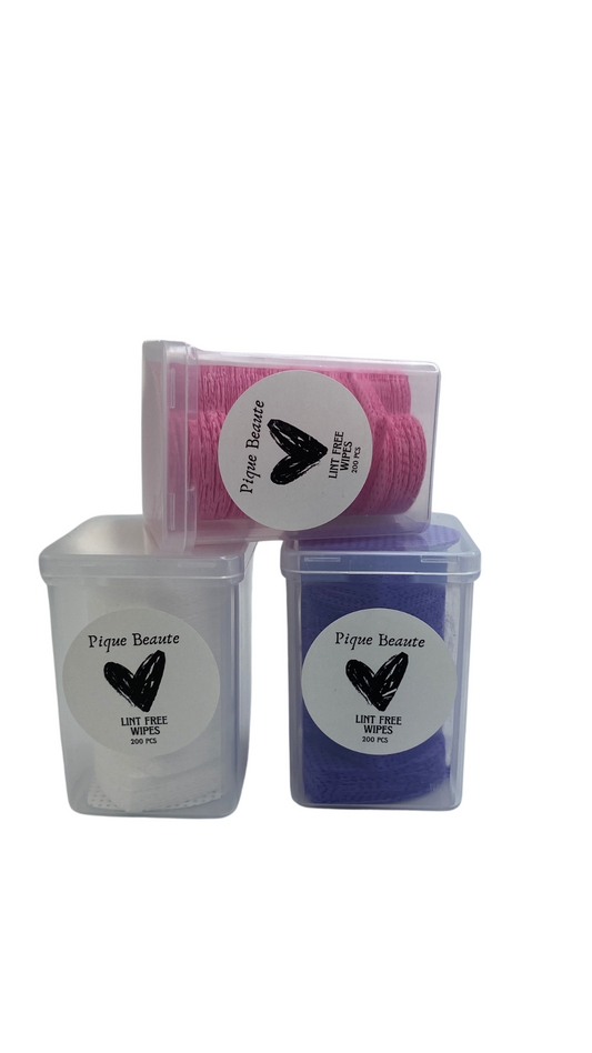 Trio Lint Free Wipes – Pink, white, and purple lint-free wipes for nail prep.